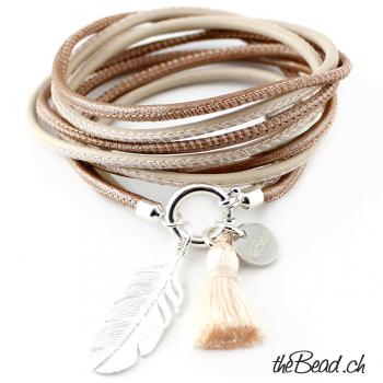 Wrap leather bracelet with feather and tassel pendant