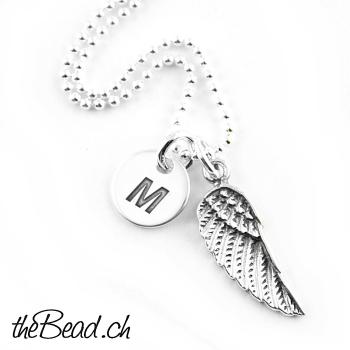 Angel wing necklace with engraved pendant