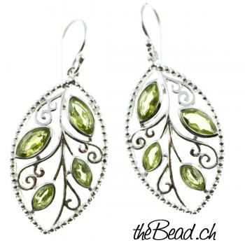 Earrings made of 925 sterling silver and green peridot