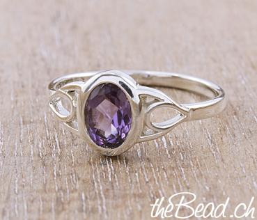 women silver finger ring made of 925 sterling silver and amethyste