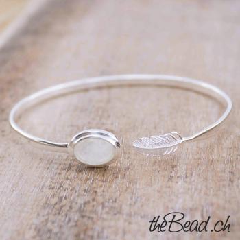 silver bracelet with feather and moonstone