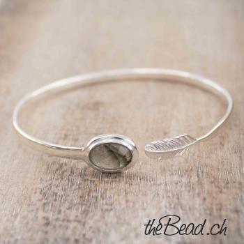 silver bracelet with feather and labradorite