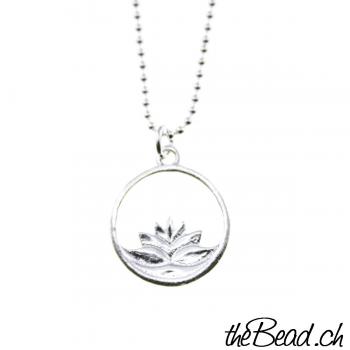 silver necklace with lotus pendant