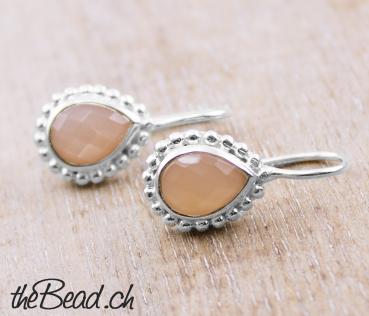 Earrings made of 925 sterling silver and orange moonstone