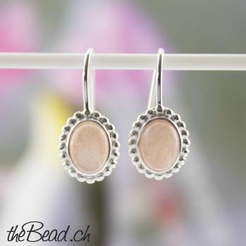 Earrings made of 925 sterling silver and orange moonstone