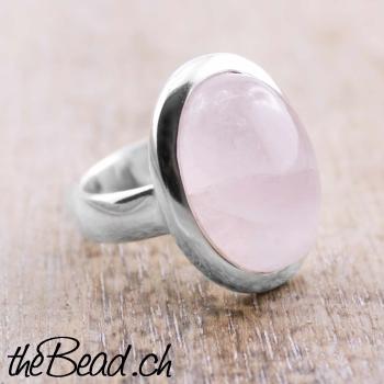 women silver finger ring made of 925 sterling silver and rose quarz
