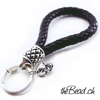 key chain made of 925 sterling silver and leather braided