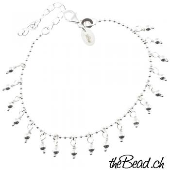 Silver bracelet with bead pendants